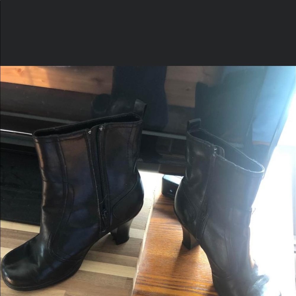 Black high heeled, zip up boots